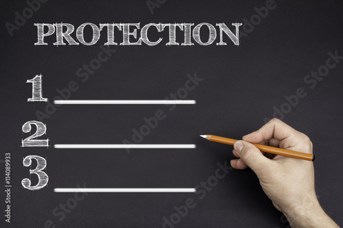 Hand with a white pencil writing: Protection blank list