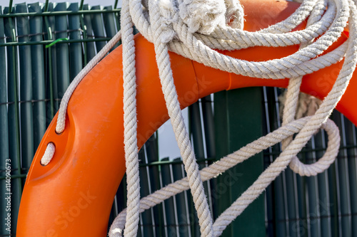 Canvas-taulu White rope and float in the lifeguard post of a swimming pool