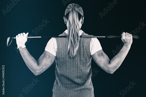 Composite image of pretty blonde playing golf