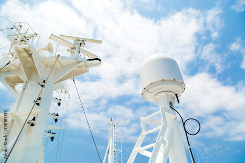 Sattelite communication antenna and radar mast of ship.