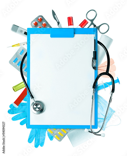 Blue clipboard, stethoscope and other medical items isolated on white photo