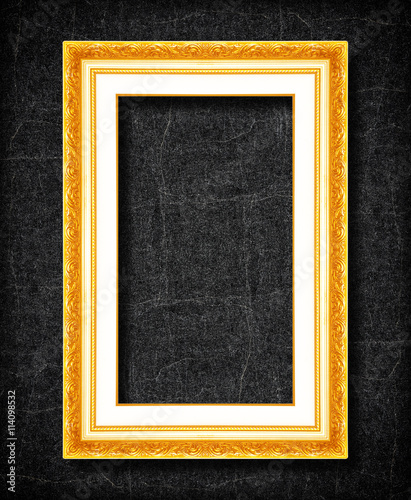 gold frame on black slate background