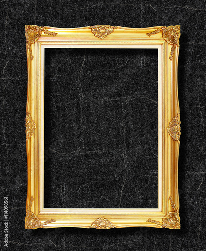 gold frame on black slate background © peekeedee