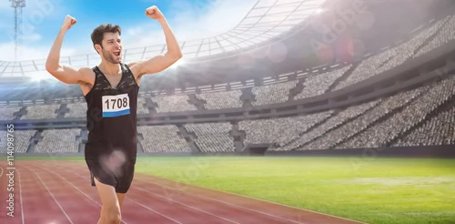Fototapeta Złożony wizerunek świętuje jego zwycięstwo sportowiec