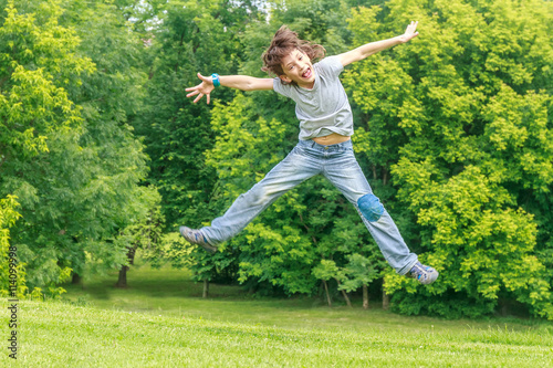 Adorable young child boy in the park. On warm summer day during © Alena Yakusheva