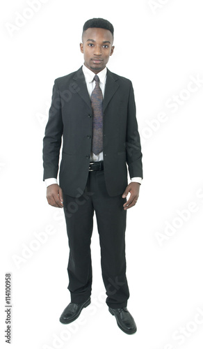 young businessman wearing suit and tie, full length