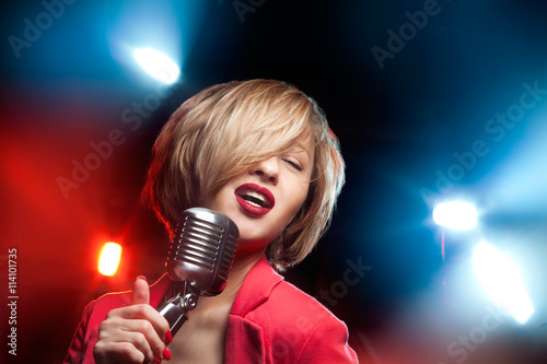 Canvas Print Woman with retro microphone