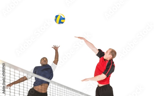 Composite image of sportsman posing while playing volleyball © vectorfusionart