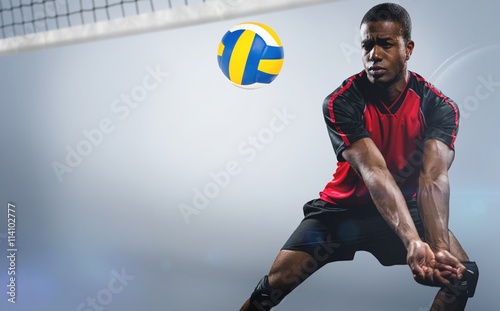 Composite image of sportsman playing volleyball