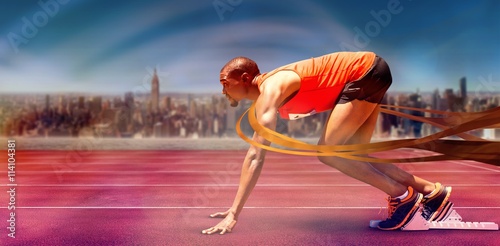 Bilde på lerret Composite image of runner preparing for the start