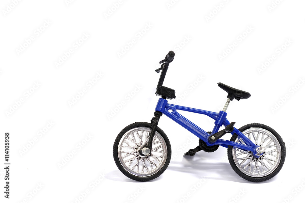 Obraz premium Bicycle toy on a white background.