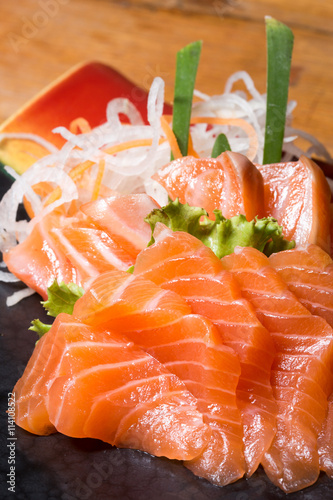 Japanese raw fish or sashimi served on a plate