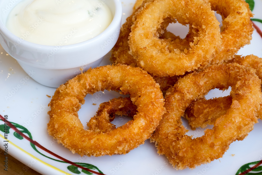 Deep fried onion ring with sauce