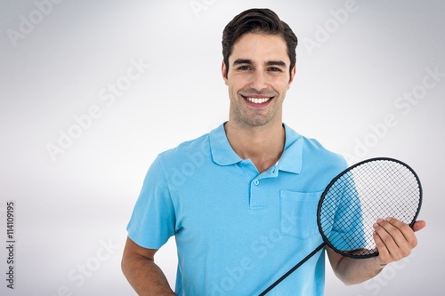 Composite image of badminton player holding badminton racket © vectorfusionart