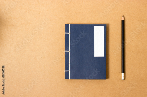 vintage notebook with pencil