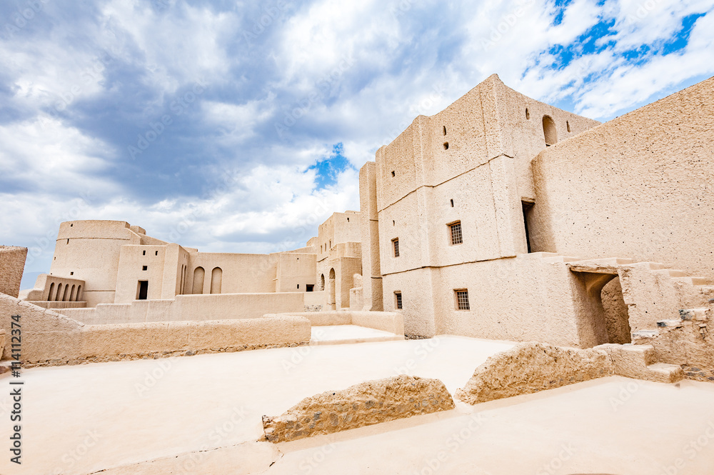 Bahla Fort in Ad Dakhiliyah, Oman. It is located about 40 km away from Nizwa and about 200 km from Muscat the capital. It has led to its designation as a UNESCO World Heritage Site in 1987.