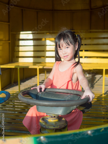 Happy kid, asian baby child playing on playground © bjginny