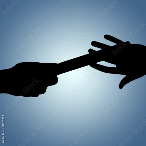 Composite image of  man passing the baton to partner on track