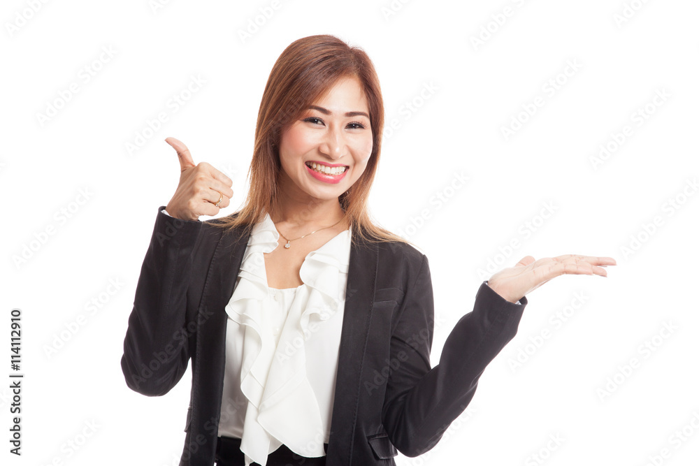 Beautiful young Asian woman show palm hand and thumbs up Beautiful young Asian woman show palm hand and thumbs up