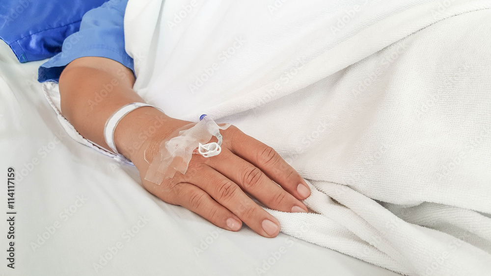 close up of saline solution preparation on hand of man patient close up of saline solution preparation on hand of man patient