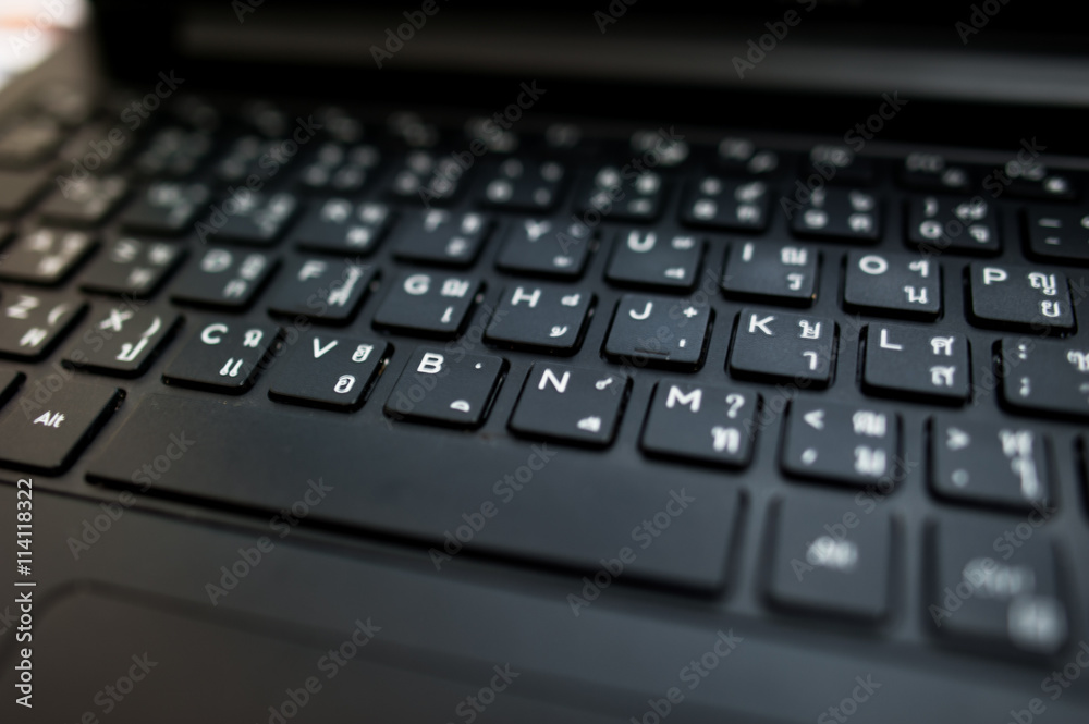 Laptop computer keyboard close-up ,Black Thai Keyboard close up Laptop computer keyboard close-up ,Black Thai Keyboard close up