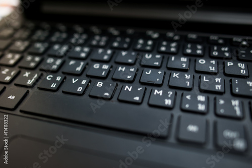 Laptop computer keyboard close-up ,Black Thai Keyboard close up