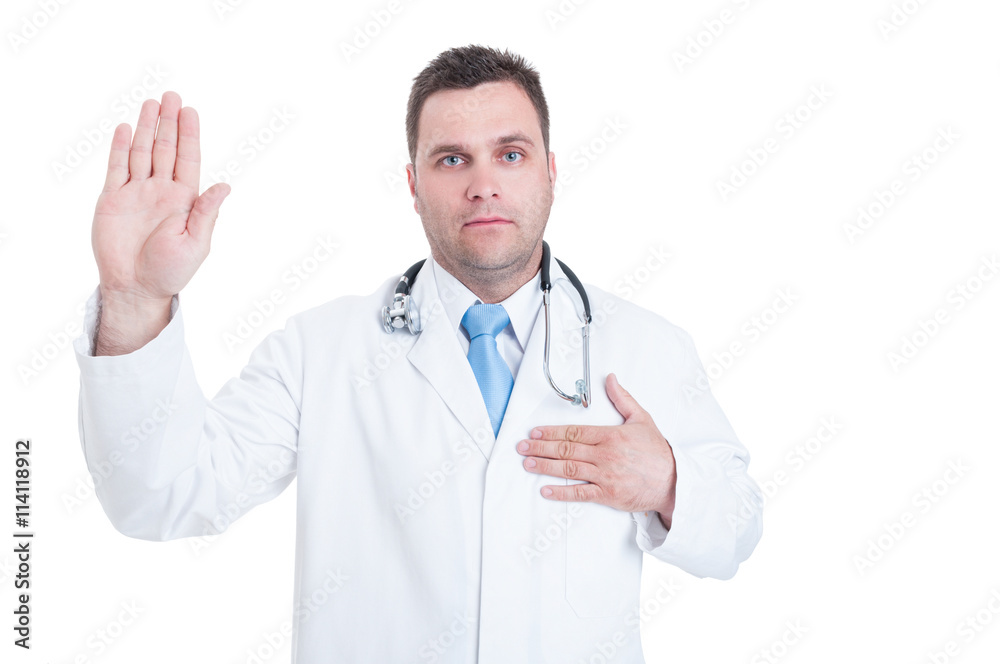 Male young doctor swearing or having the Hippocratic oath Male young doctor swearing or having the Hippocratic oath