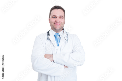 Male doctor standing arms crossed acting confident or successful