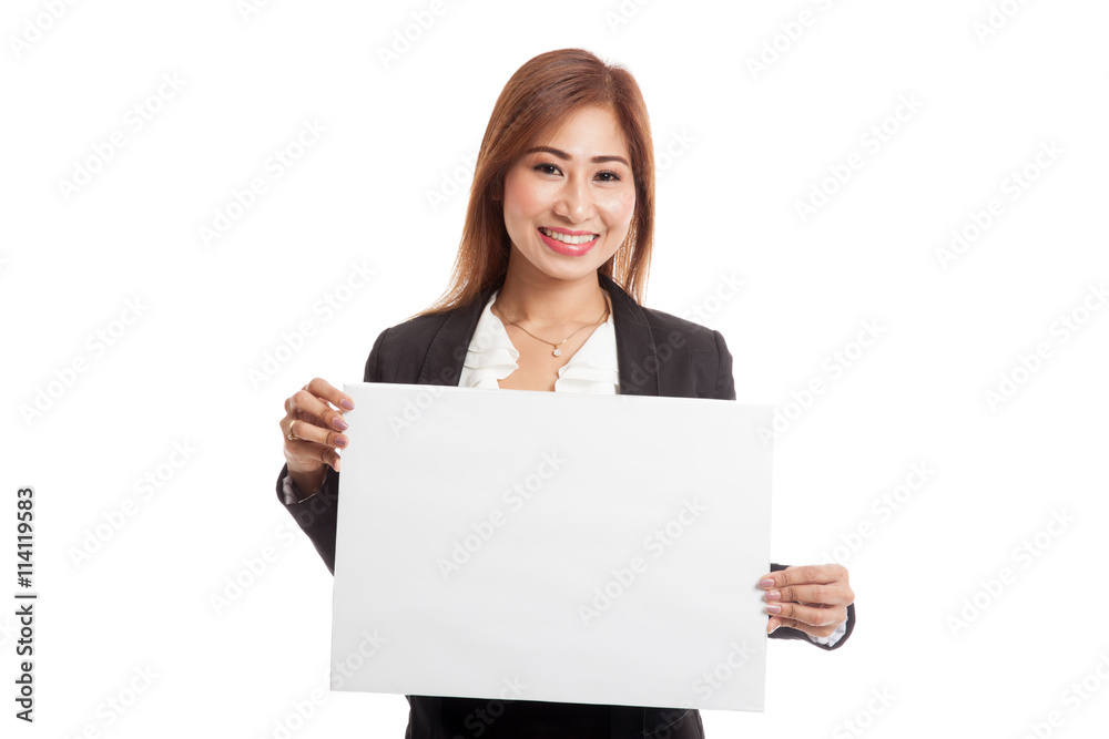 Young Asian business woman with white blank sign Young Asian business woman with white blank sign