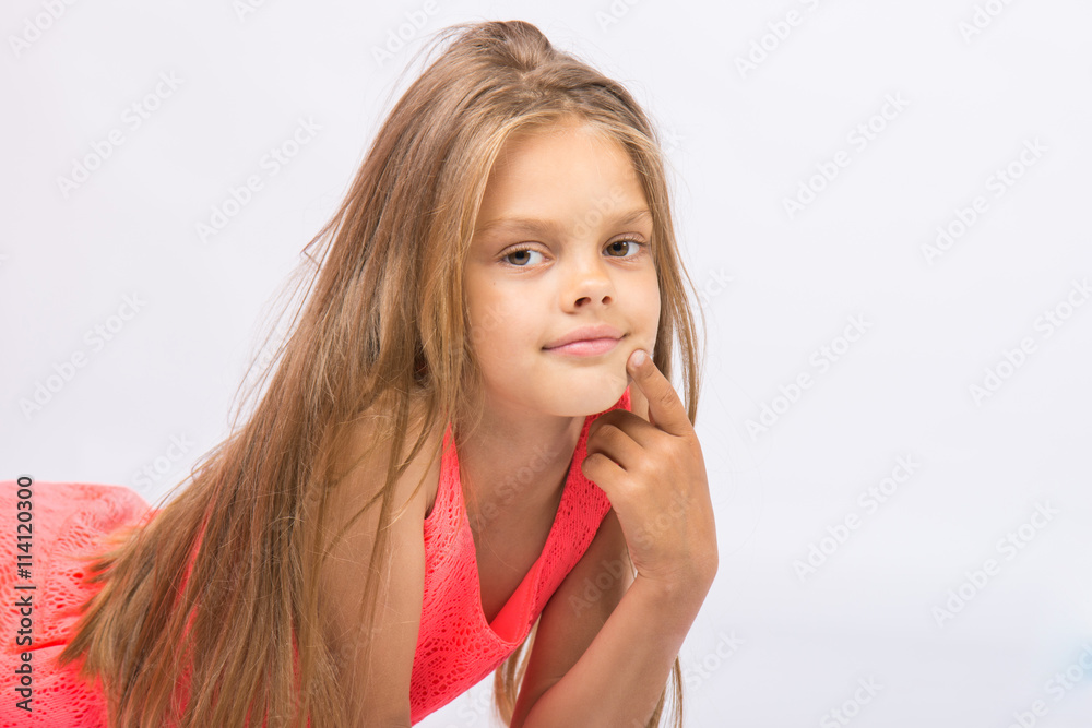 Portrait of a seven-year Conceived girl on a white background Portrait of a seven-year Conceived girl on a white background