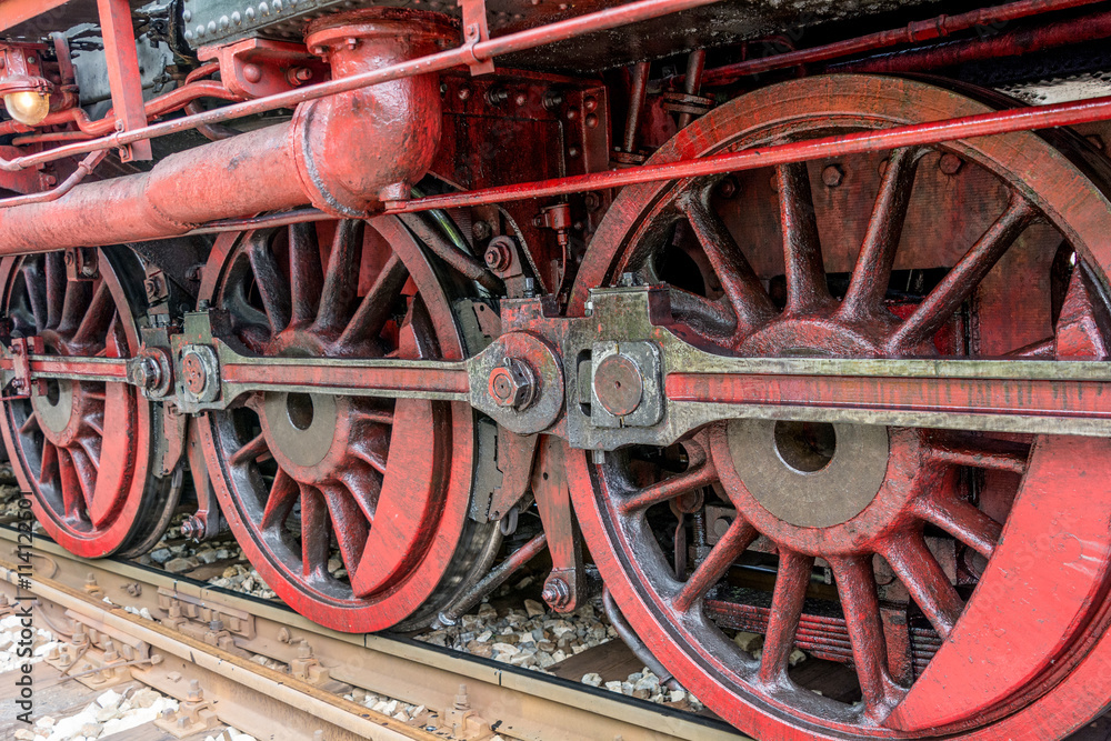 Detail and close up of huge steam locomotive wheels Detail and close up of huge steam locomotive wheels