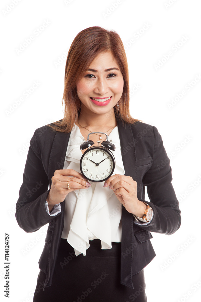 Young Asian business woman smile with a clock Young Asian business woman smile with a clock