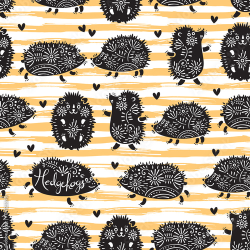 Seamless pattern with decorative hedgehogs. Cute kids background.