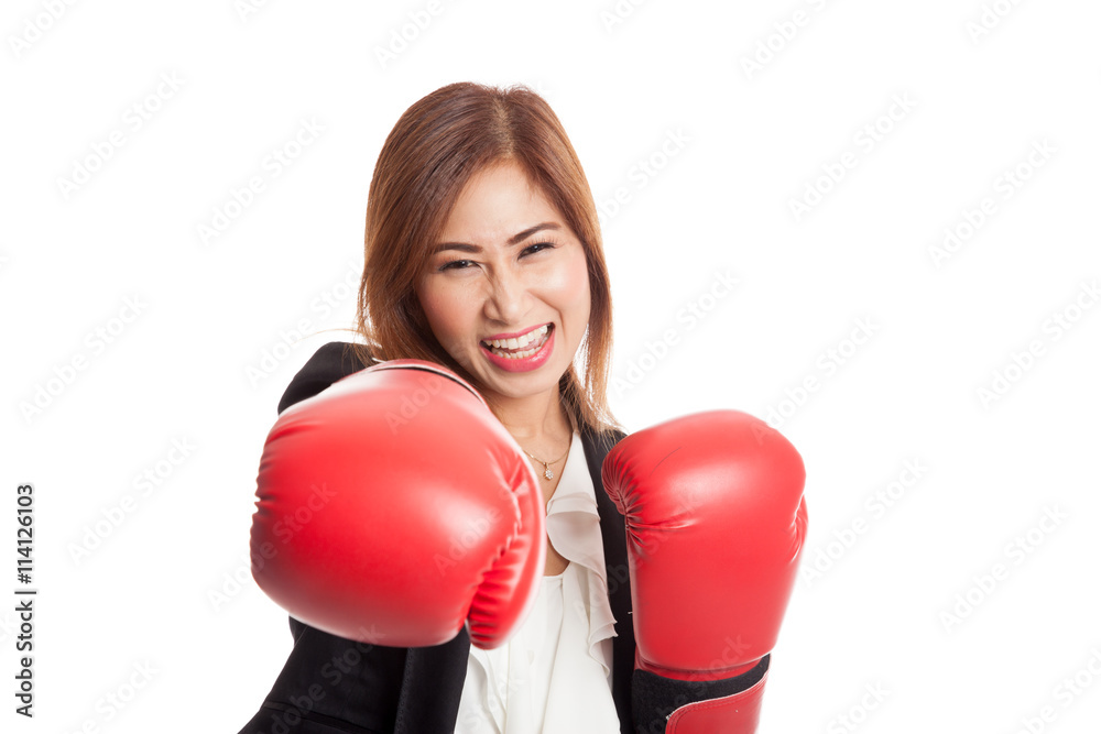Young Asian business woman with red boxing gloves Young Asian business woman with red boxing gloves