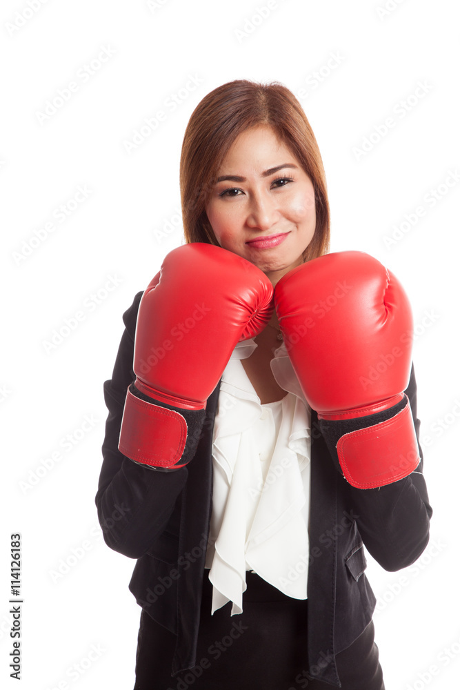 Young Asian business woman with red boxing gloves Young Asian business woman with red boxing gloves