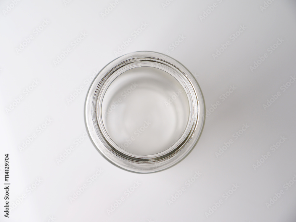 glass jar on a gray background glass jar on a gray background