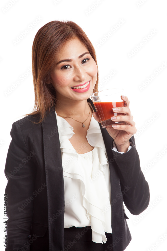 Young Asian business woman drink tomato juice Young Asian business woman drink tomato juice