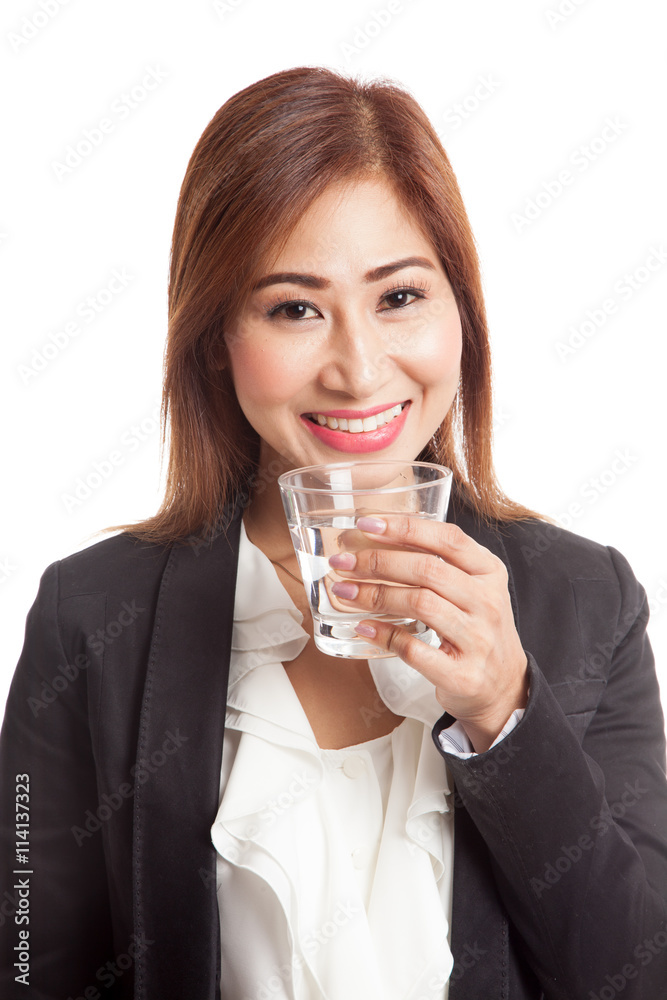 Young Asian woman with a glass of drinking water Young Asian woman with a glass of drinking water