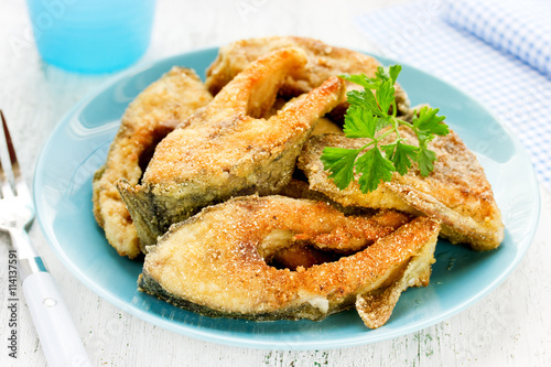 Fried fish in blue plate