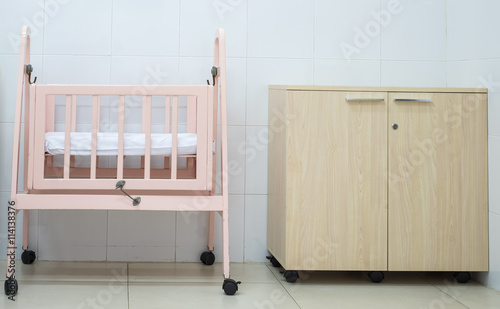 Cradle newborn room interior. Wooden Cot Frame for a new baby.