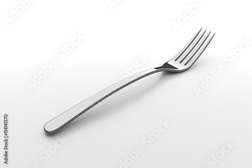 Silver fork on grey background