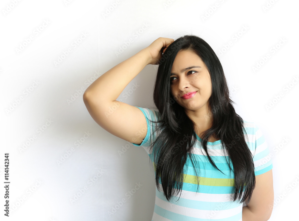 Portrait of confused indian woman scratching his head. Portrait of confused indian woman scratching his head.