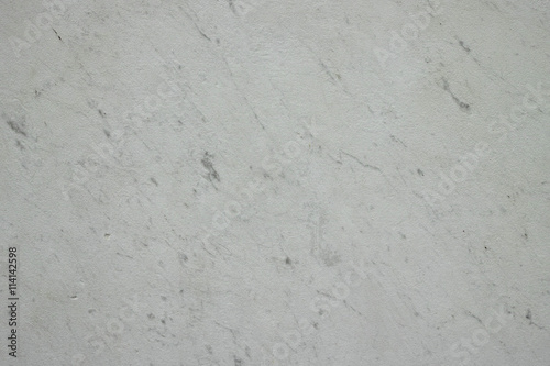 Finely textured worn veined marble travertine stone background