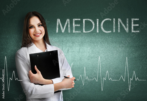 Young beautiful doctor with...
