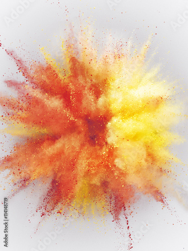 Abstract orange and yellow powder explosion