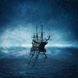 A ghost pirate ship floating on a cold dark blue sea landscape with a starry night sky background and water reflection.
