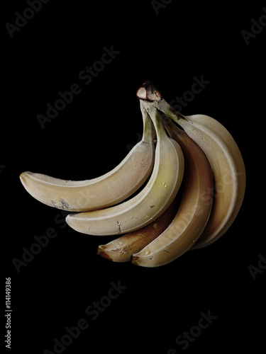 Bunch of bananas on black background