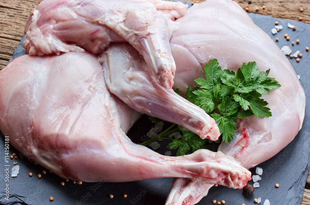 Raw rabbit legs, dietary meat close up