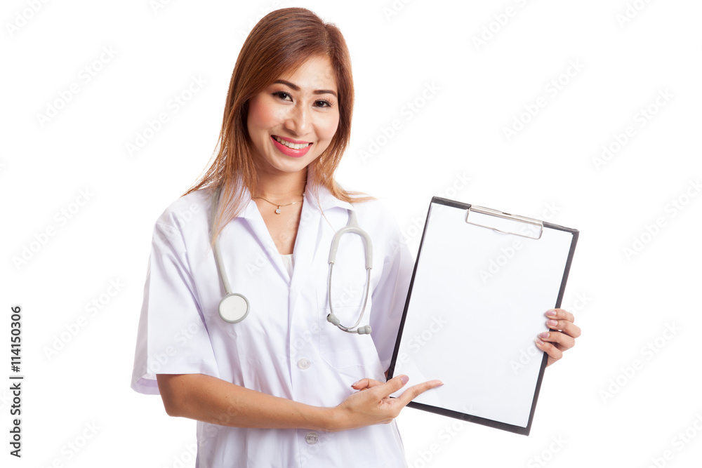 Young Asian female doctor point to a blank clipboard Young Asian female doctor point to a blank clipboard