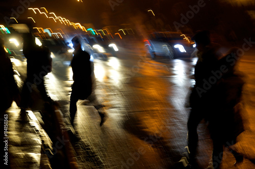 Fototapeta Naklejka Na Ścianę i Meble -  Busy city street people on zebra crossing